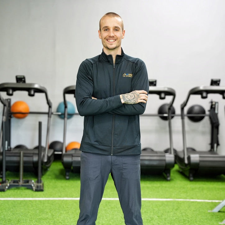 Maxime Sigouin standing in gym
